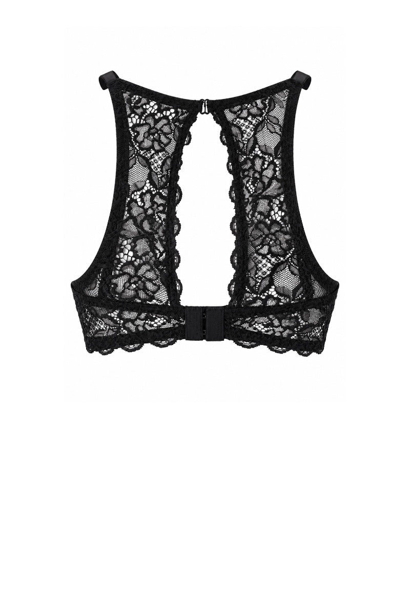 Back of a black lace bra shown on a white background. 