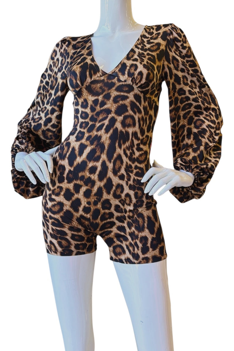 A leopard-print short romper displayed on a white mannequin with long puff sleeves and a V-neckline, photographed against a plain white background.
