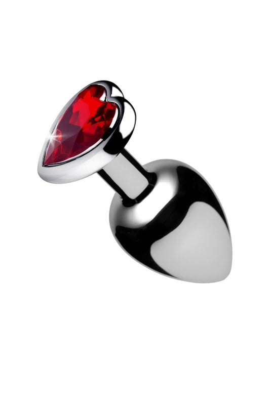 Metallic booty plug with a red gem on a white background