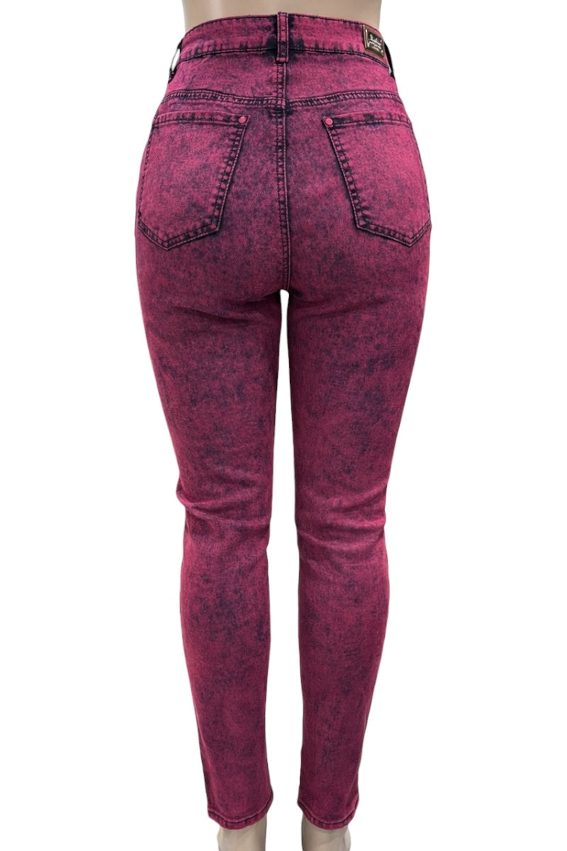 red acid-wash jeans on a white background