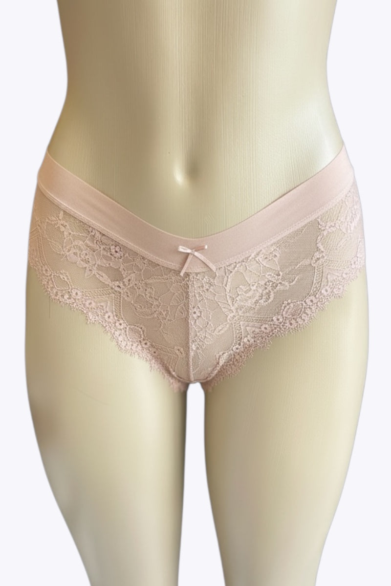 Pink Lace-trimmed underwear on a mannequin against a white background