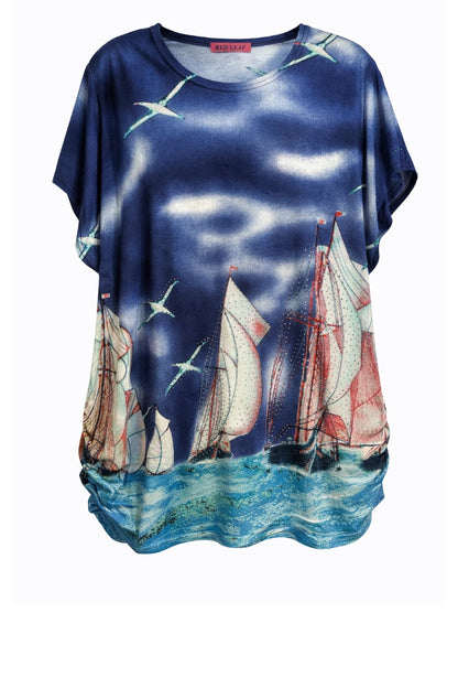 Blue shirt with sailboat design on a white background