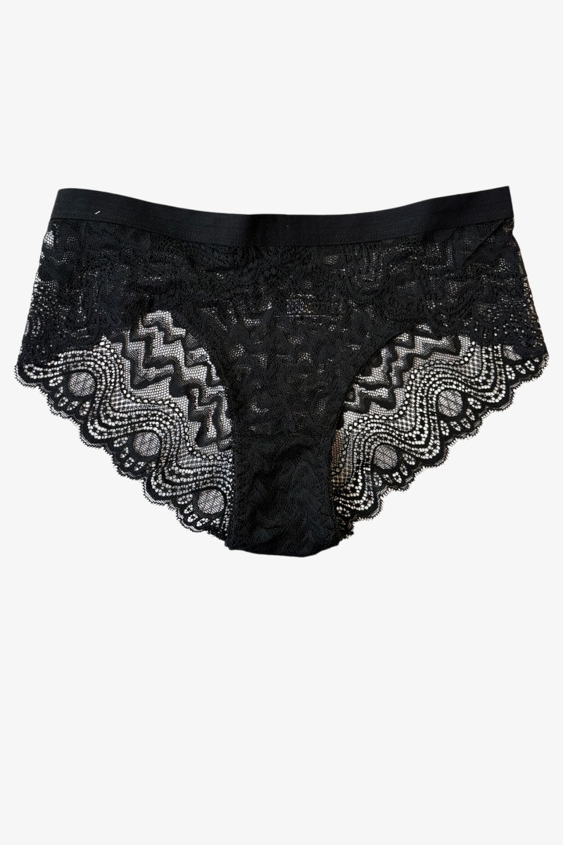 Black lace underwear with intricate patterns on a white background