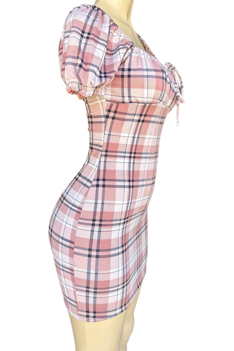 Plaid dress on a mannequin against a white background