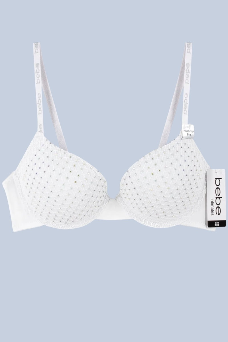 White bra with 'bebe' packaging on a light blue background