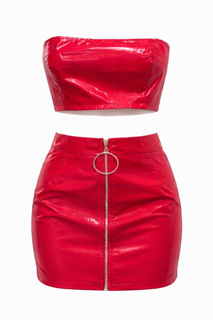 Red vinyl two-piece outfit with a top and skirt on a white background