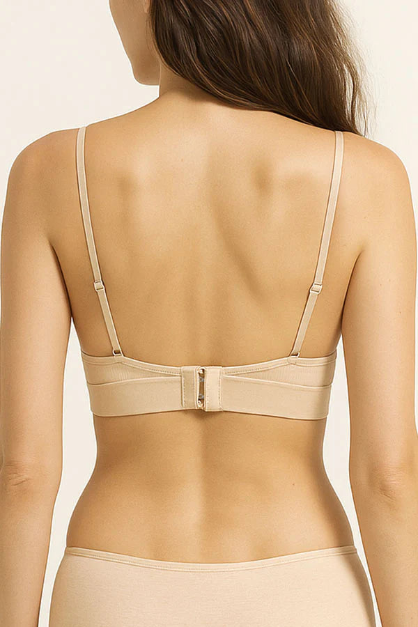 cream bralette worn by a person on a plain background