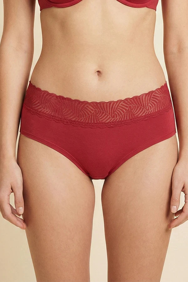 Burgundy Red underwear with lace waistband on a beige background