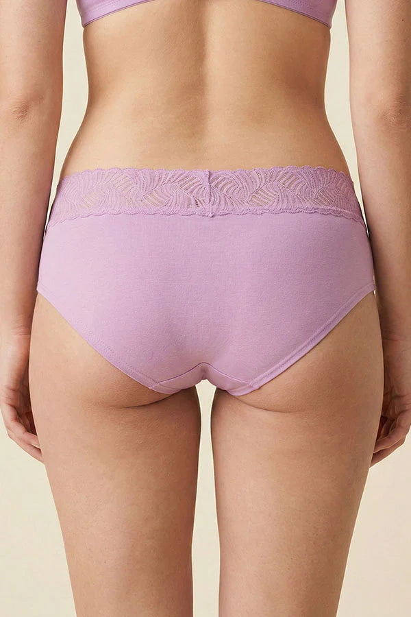 Mauve Purple underwear worn by a person on a beige background