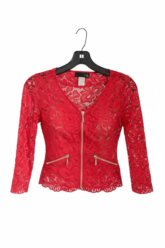 Red lace jacket on a hanger against a white background