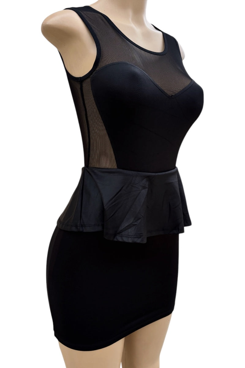Black dress with sheer mesh panels on a mannequin against a white background