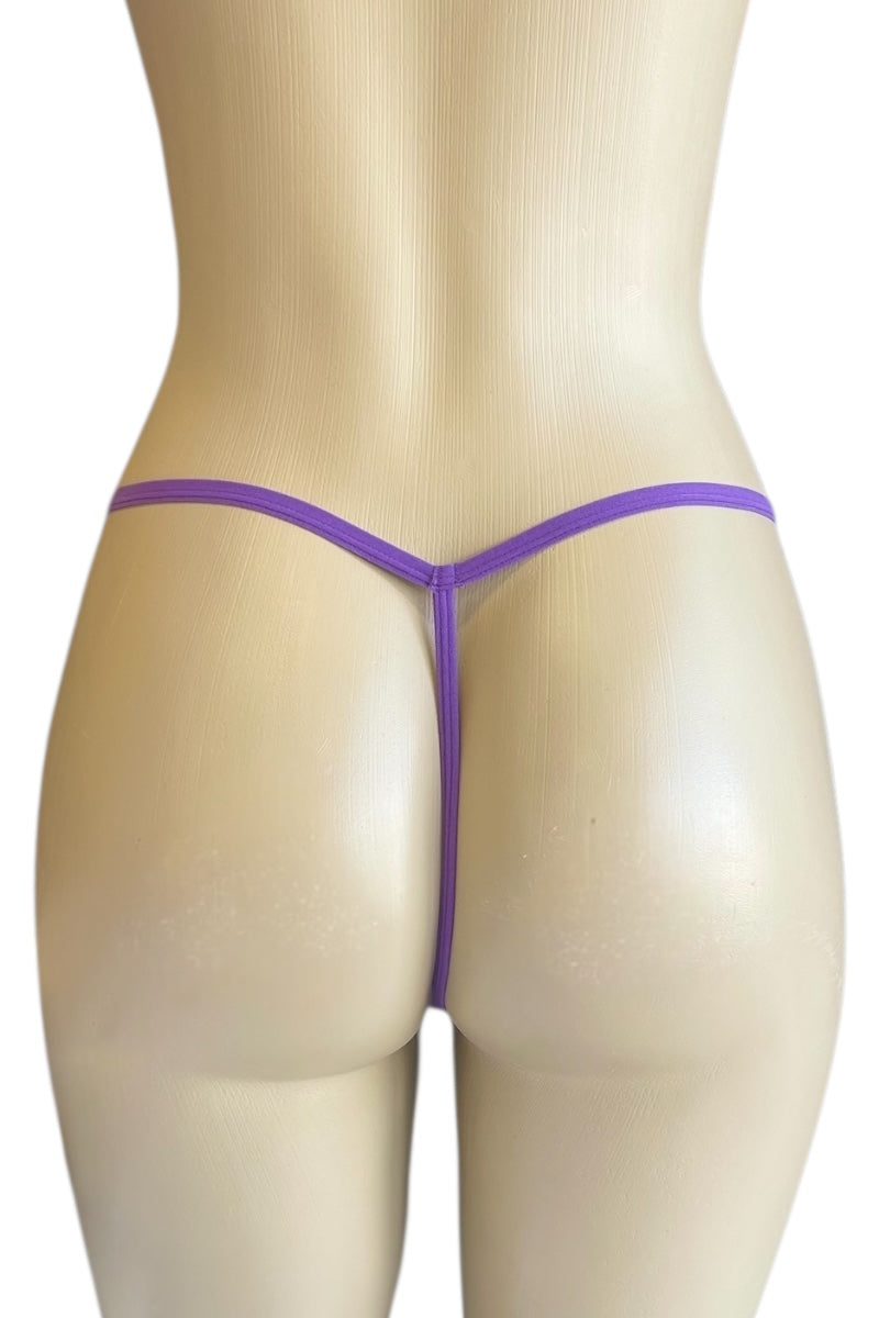 Purple thong on a mannequin against a white background