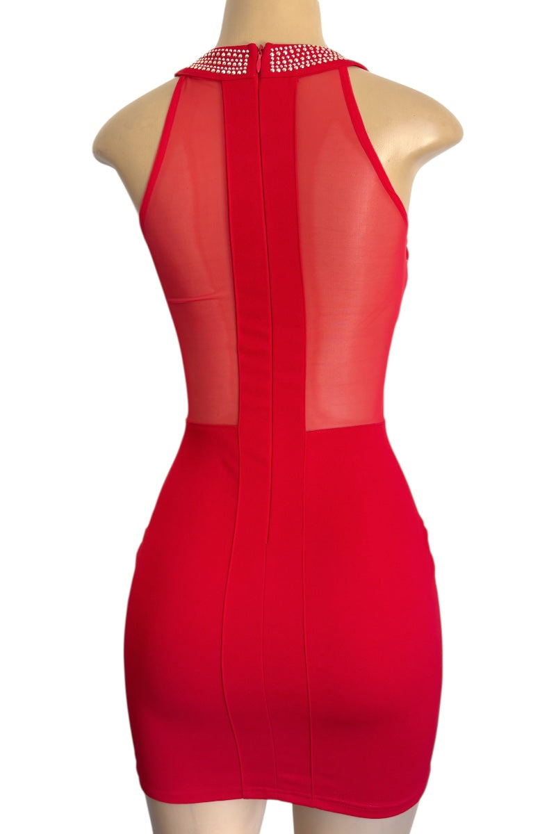 Red dress with mesh panels on a mannequin against a white background