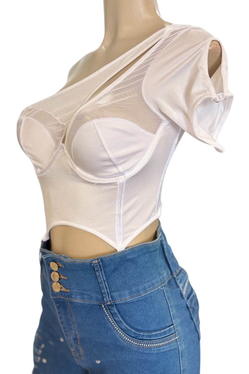 Mannequin wearing a white sheer top and blue jeans on a white background