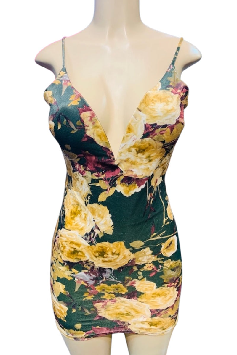 Floral dress on a mannequin with a white background
