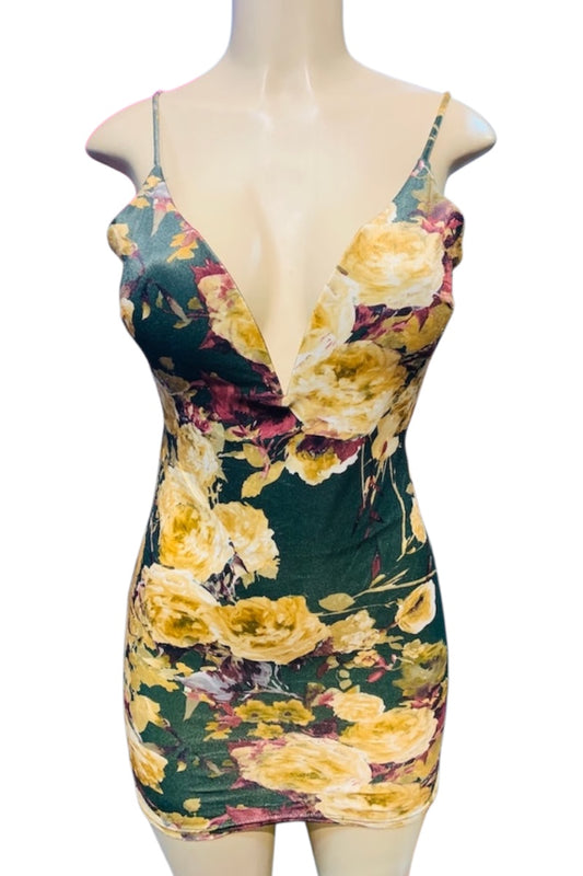 Floral dress on a mannequin with a white background
