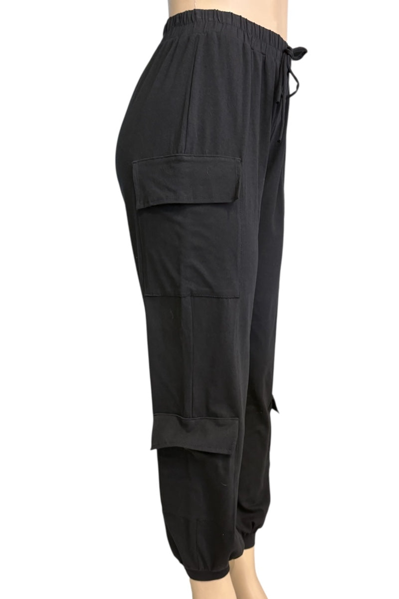 Black cargo jogger pants with side flap pockets and a drawstring waist, shown on a cropped mannequin against a white background.