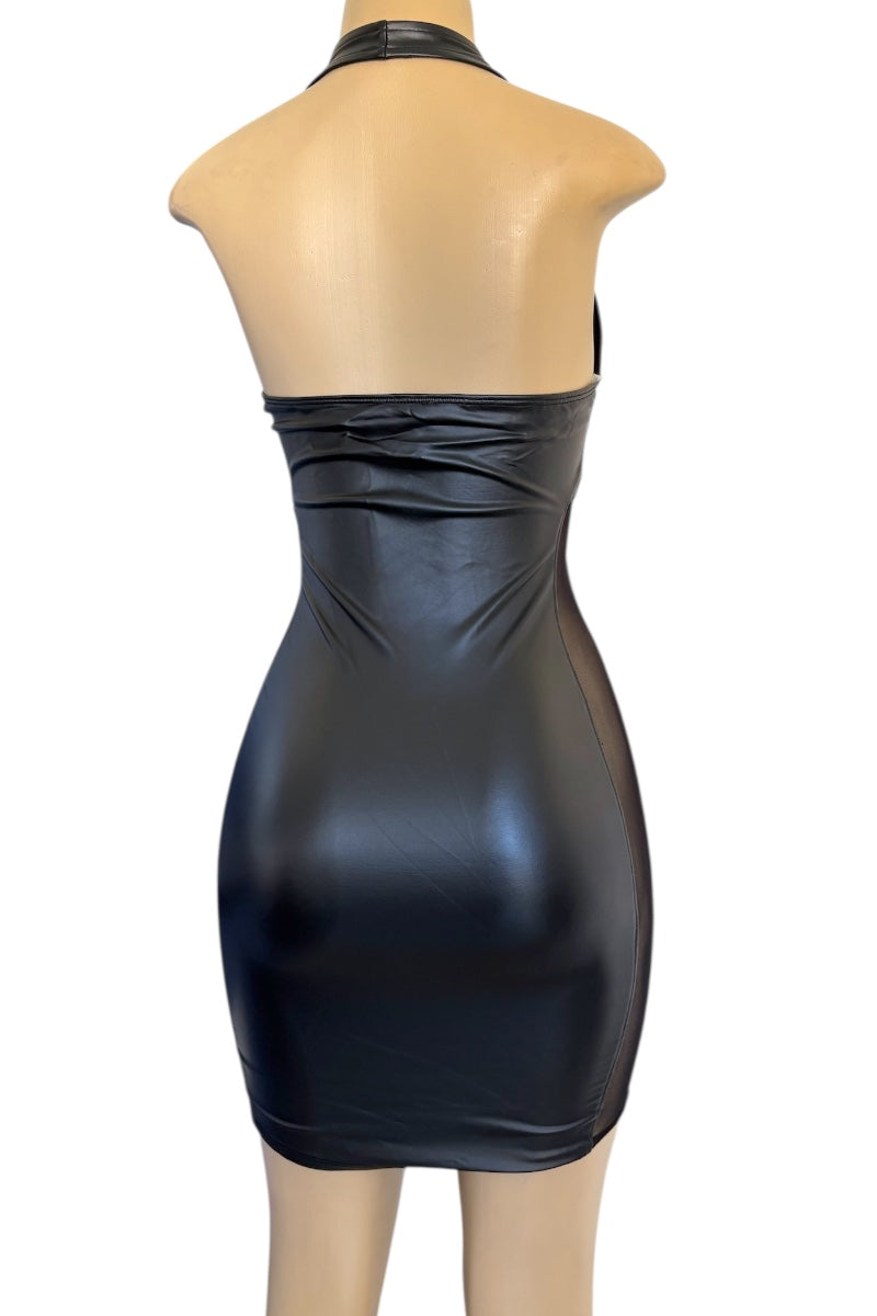 Black dress on a mannequin against a white background