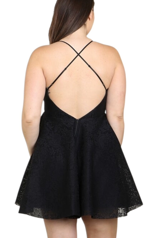 Black lace dress with thin straps on a white background