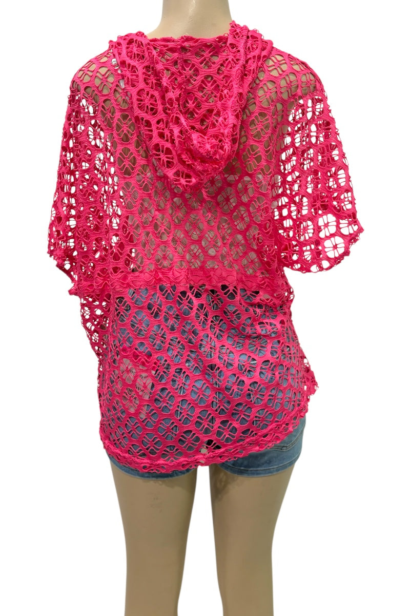 Pink crochet top worn by a mannequin on a white background