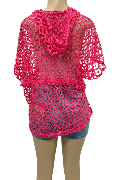 Pink crochet top worn by a mannequin on a white background