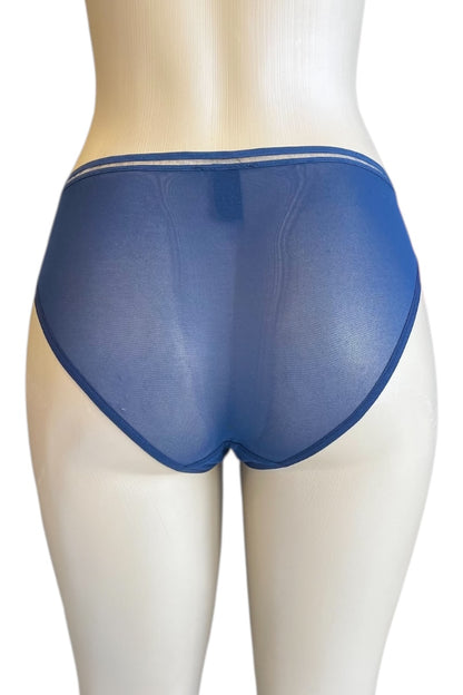 Blue underwear on a mannequin against a white background