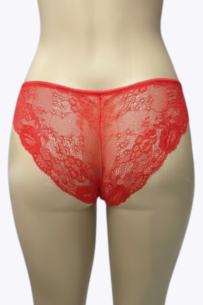 Red lace panty on a mannequin against a white background