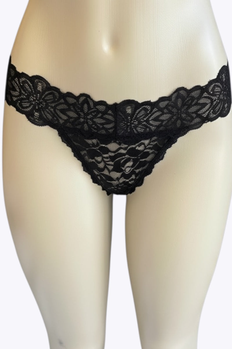 Black lace thong on a mannequin against a white background