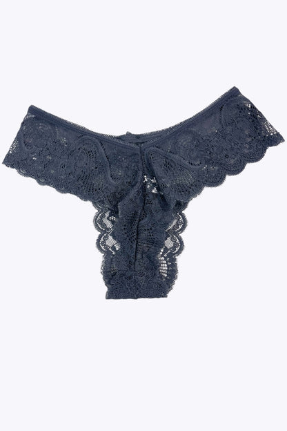 dark blue lace thong on a white background