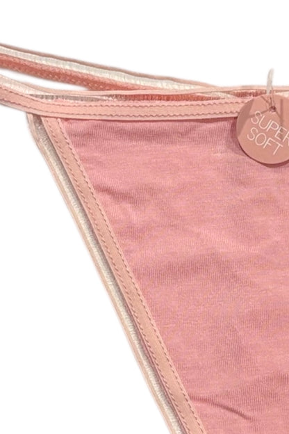 Pink fabric with a 'Super Soft' tag on a white background