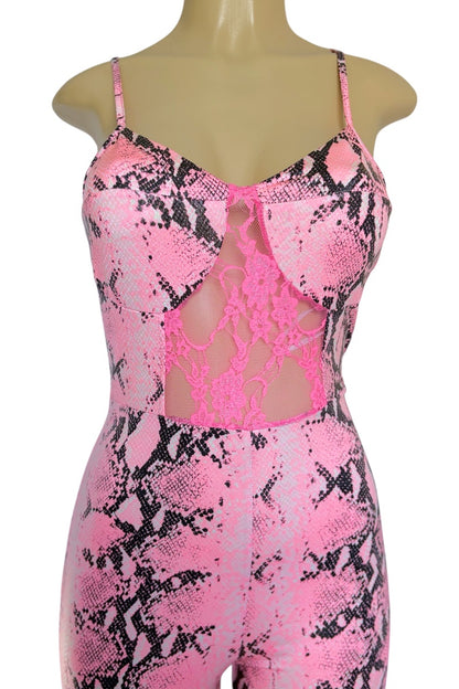 Pink and black patterned jumpsuit on a mannequin