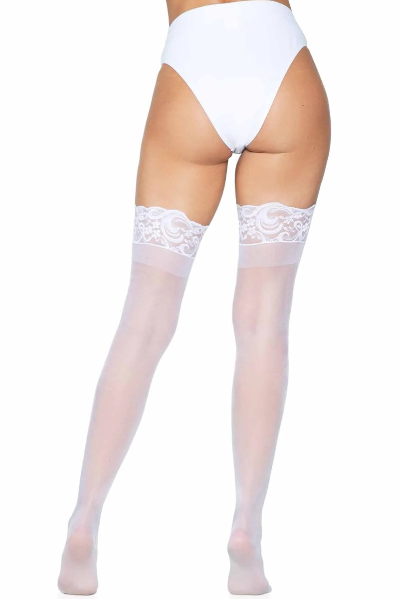 White lace thigh-high stockings worn with a white thong on a white background