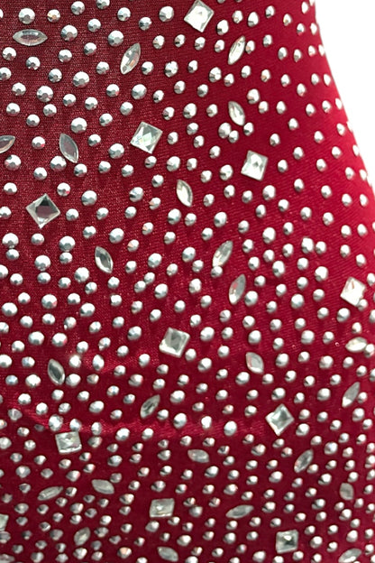 Burgundy fabric with embellishments