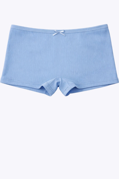 Light blue ribbed shorts on a white background