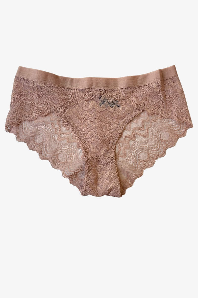 Beige lace underwear on a white background