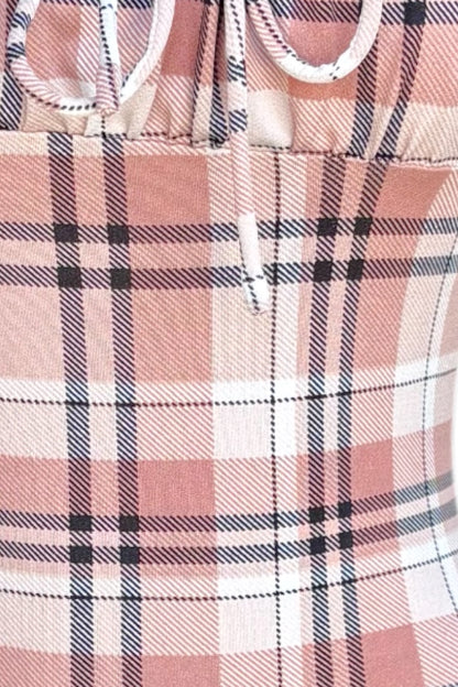 Close-up of a pink plaid dress 