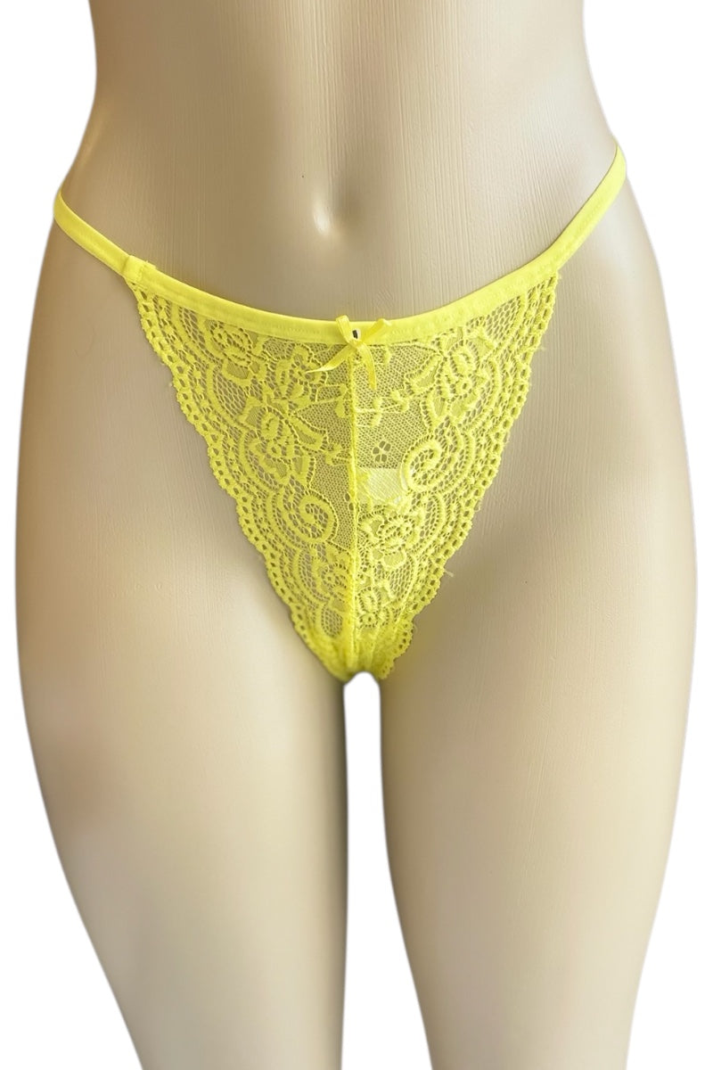 Yellow lace thong on a mannequin against a white background
