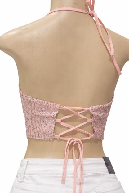 Pink lace-up top on a mannequin with a white background