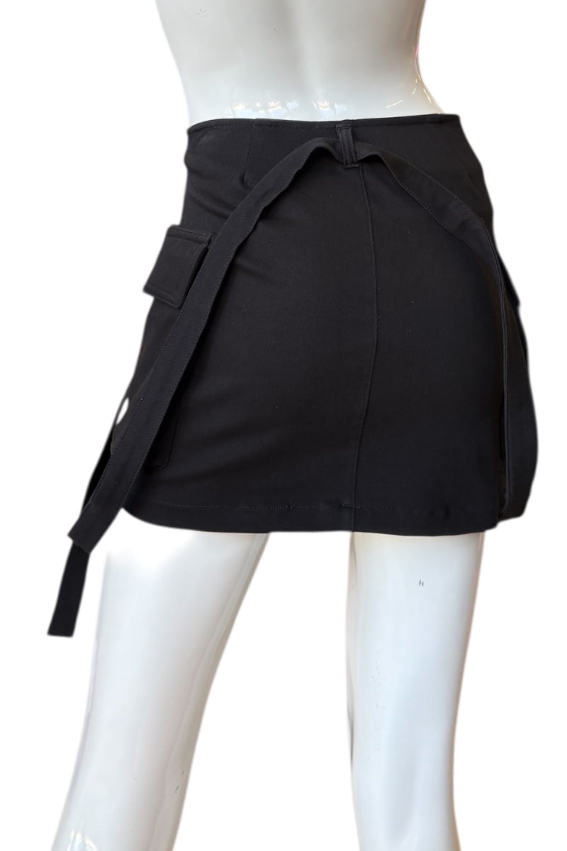 Black skirt on a mannequin against a white background