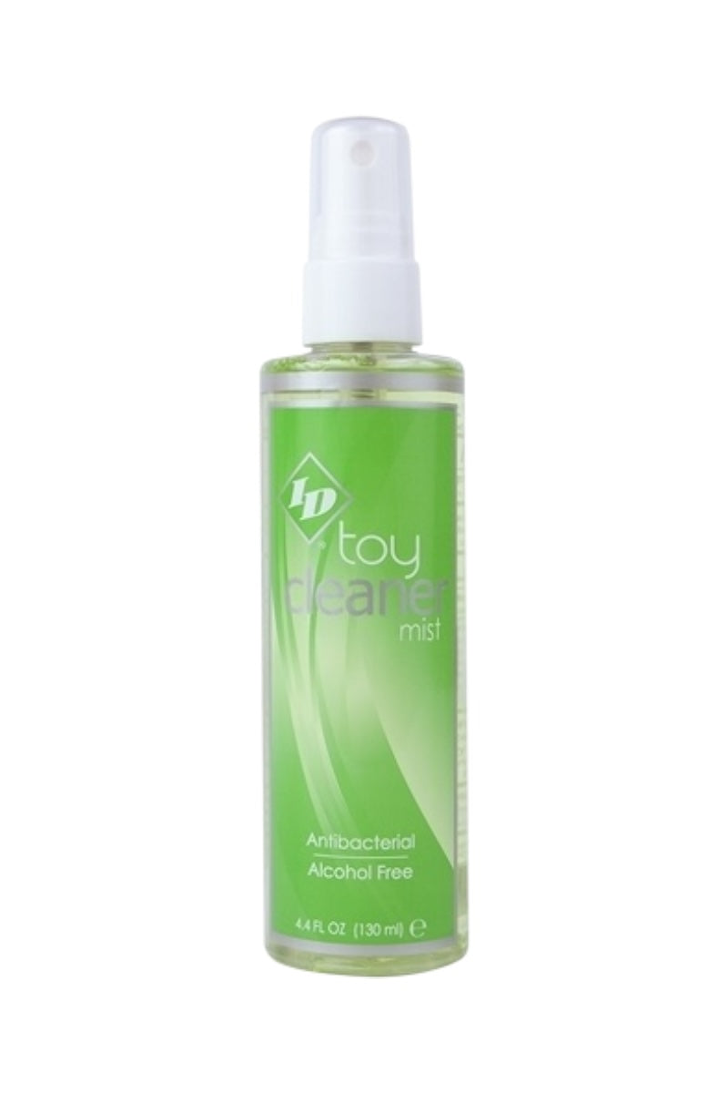 Green spray bottle labeled 'toy cleaner mist' on a white background