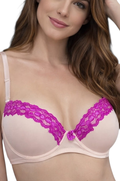 Woman wearing a beige bra with purple lace trim on a white background