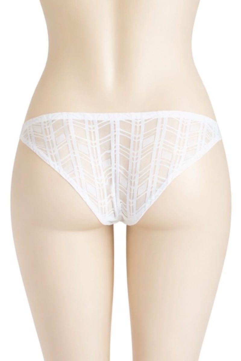 White lace thong on a mannequin against a white background