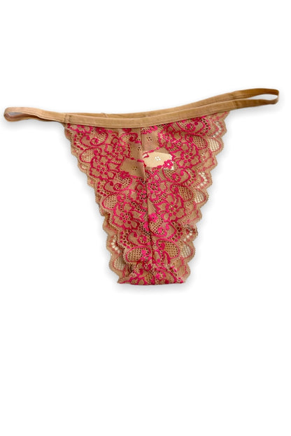 Pink lace thong on a white background