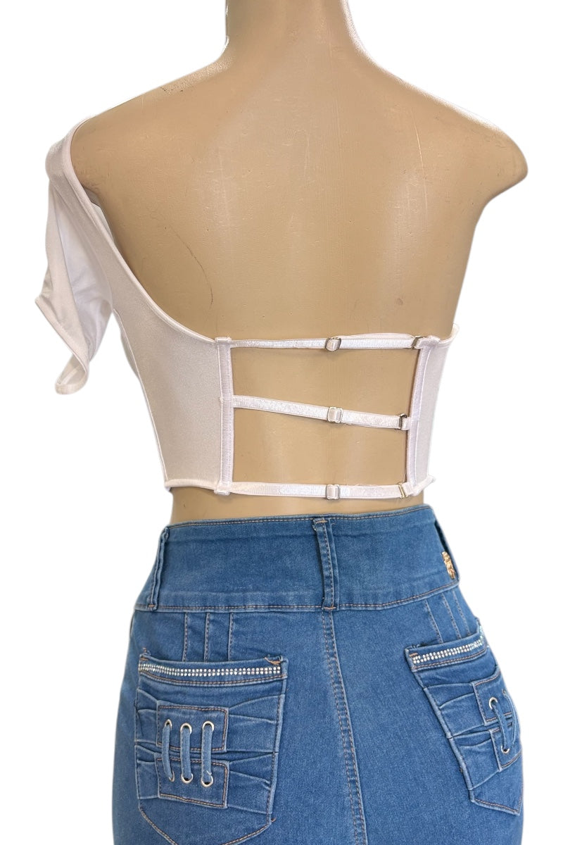 Mannequin wearing a white sheer crop top with mesh panels and blue jeans.