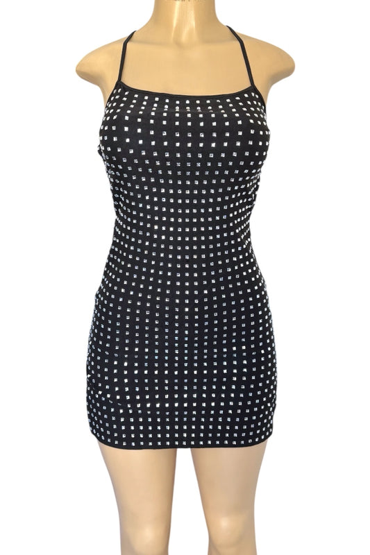 Black dress with rhinestone pattern on a mannequin against a white background