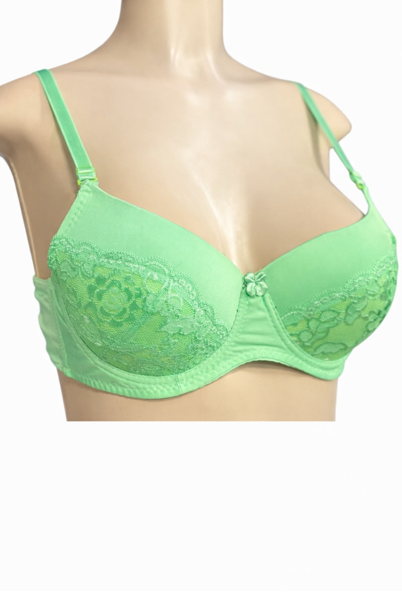 Green bra on a mannequin with a white background