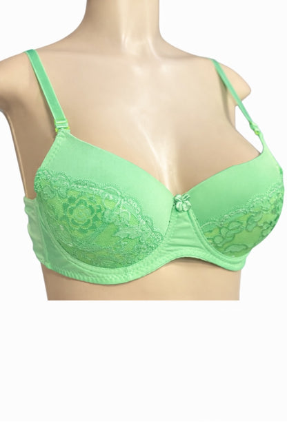 Green bra on a mannequin with a white background