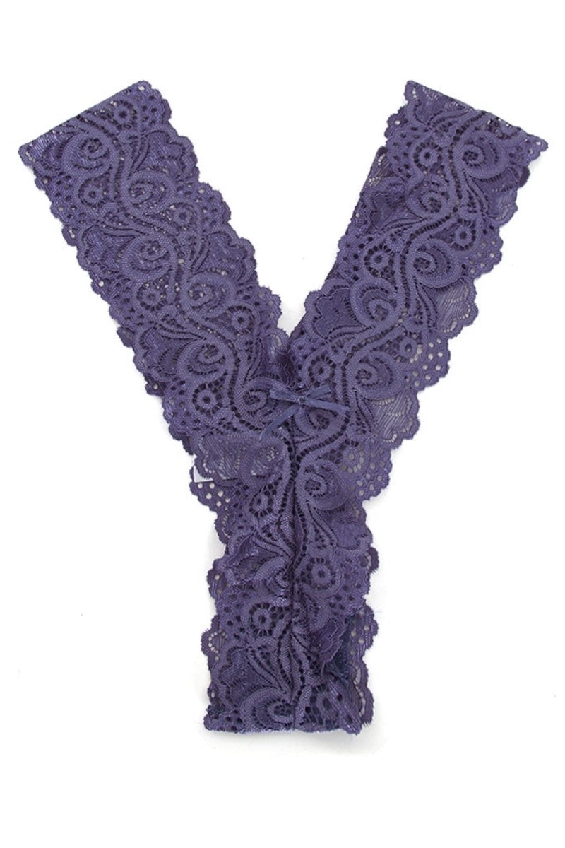 Pair of blue lace thong on a white background