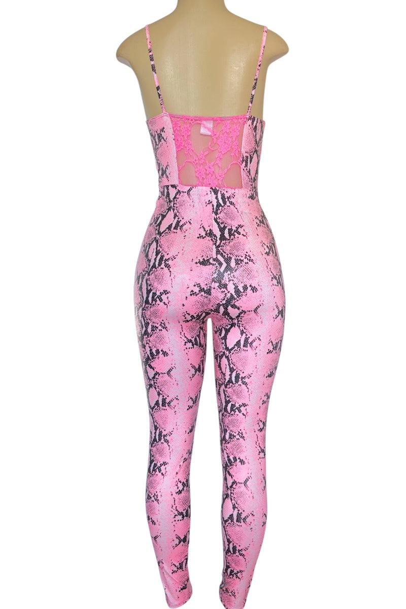 Pink snakeskin print jumpsuit on a mannequin against a white background