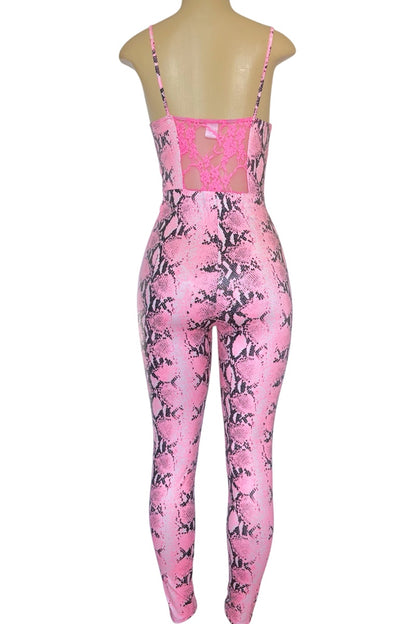 Pink snakeskin print jumpsuit on a mannequin against a white background
